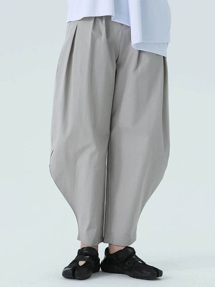 Assata's Rassah Harem Pants - Gray. Step into comfort and style with our Rassah Harem Pants in a chic gray hue. Designed for the modern individual, these pants are the perfect blend of relaxation and f featuring Rassah Harem Pants - Gray from Assata.